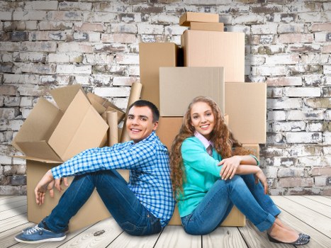 Household moving team working in a South West London property