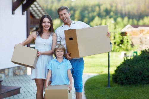 Local moving team preparing furniture and cartons for an Eastsheen move