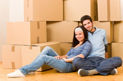 Local moving van helping with boxes and household items in Eastsheen