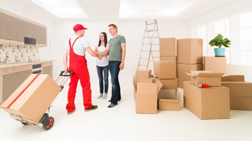 Van loaded with boxes and furniture for removals in Eastsheen