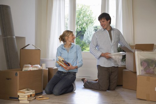 Loading household items into a removal van in Eastsheen